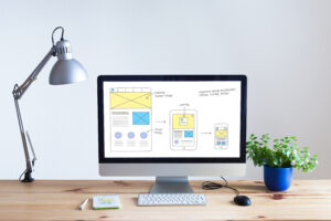 Responsive web design website wireframe sketch layout on computer screen