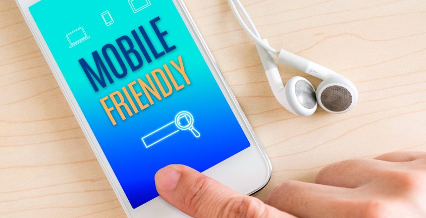 DP Mobile Friendly Phone on Table with Headphones