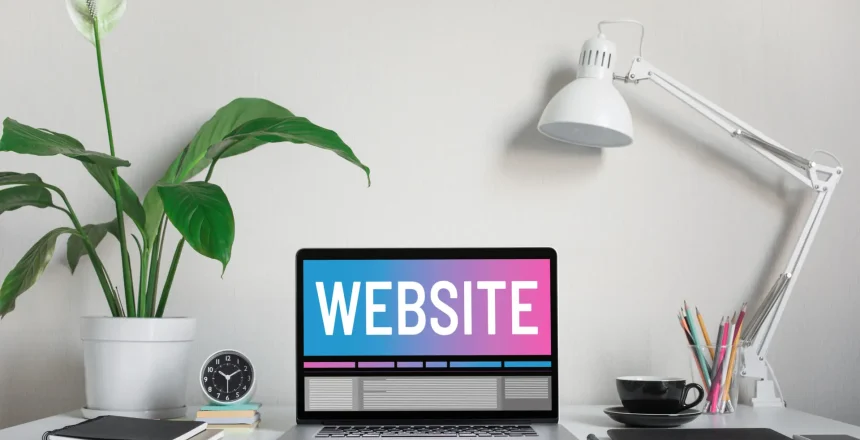 Website or web design concepts with text on modern computer laptop and accessories on worktable