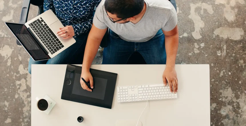 Graphic designers cooperating at work