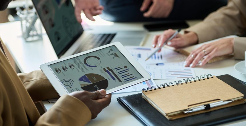Man with tablet preparing presentation