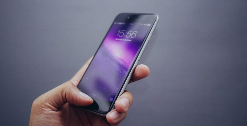 iPhone In Hand e1459678570592